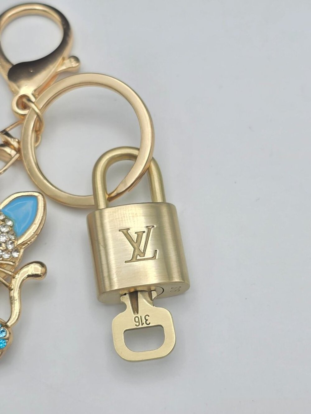 Louis Vuitton Gold Lock 🔑 Authentic LV Padlock + Unbranded Cat Bag Charm - Picture 6 of 8